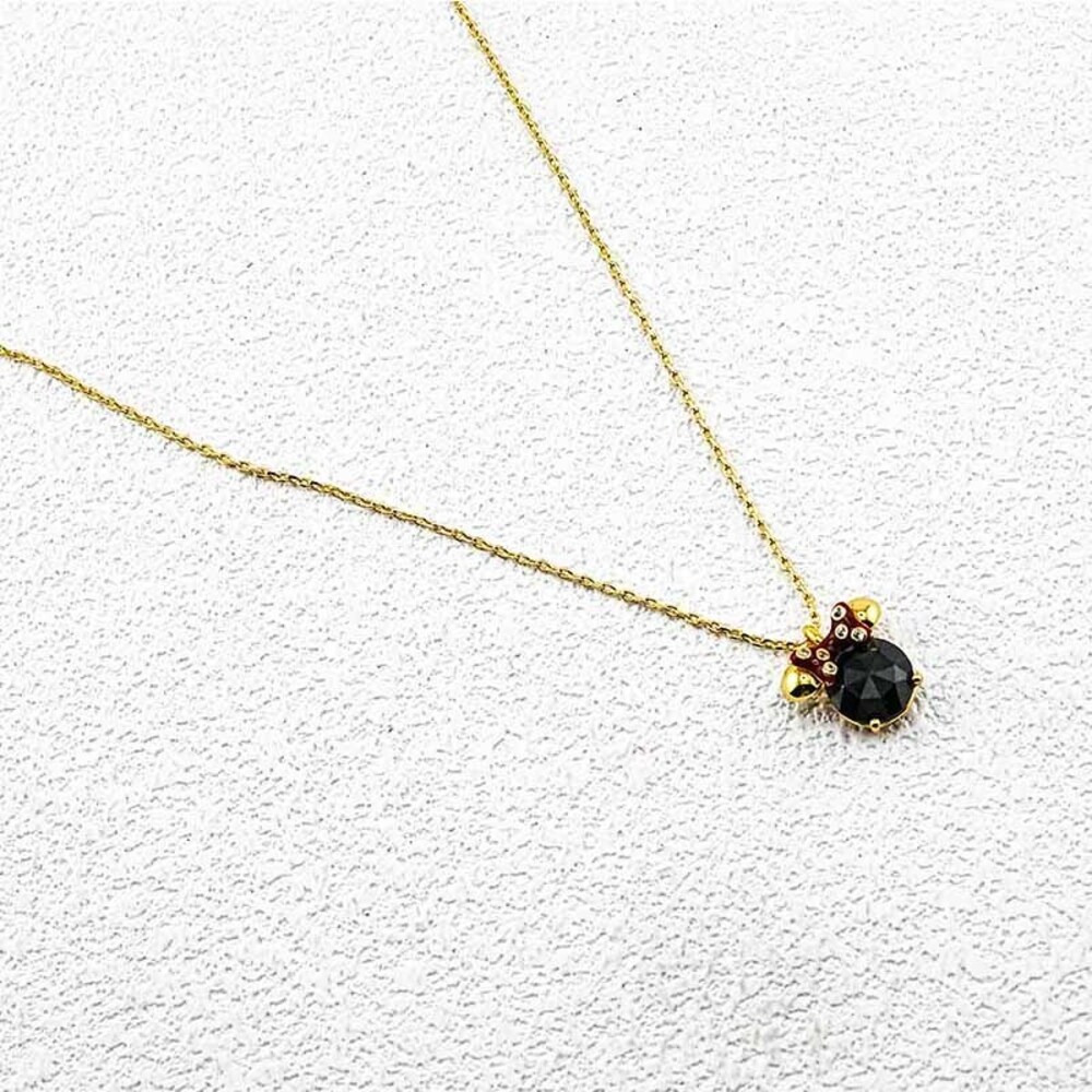 kate spade Gold Tone Necklace with Black Faceted Stone